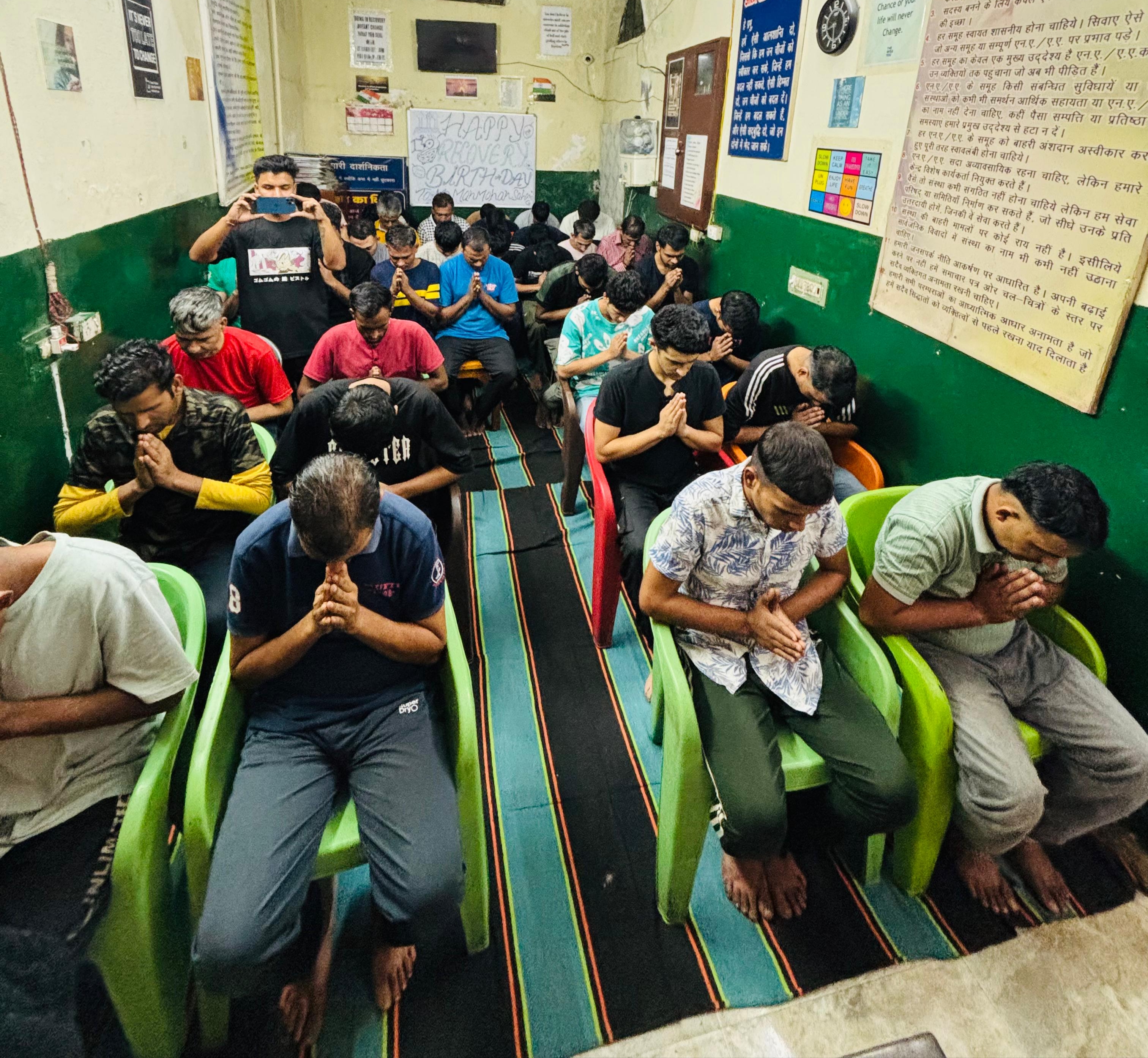 Group meditation and spiritual recovery session at Jaago Nasha Mukti Kendra